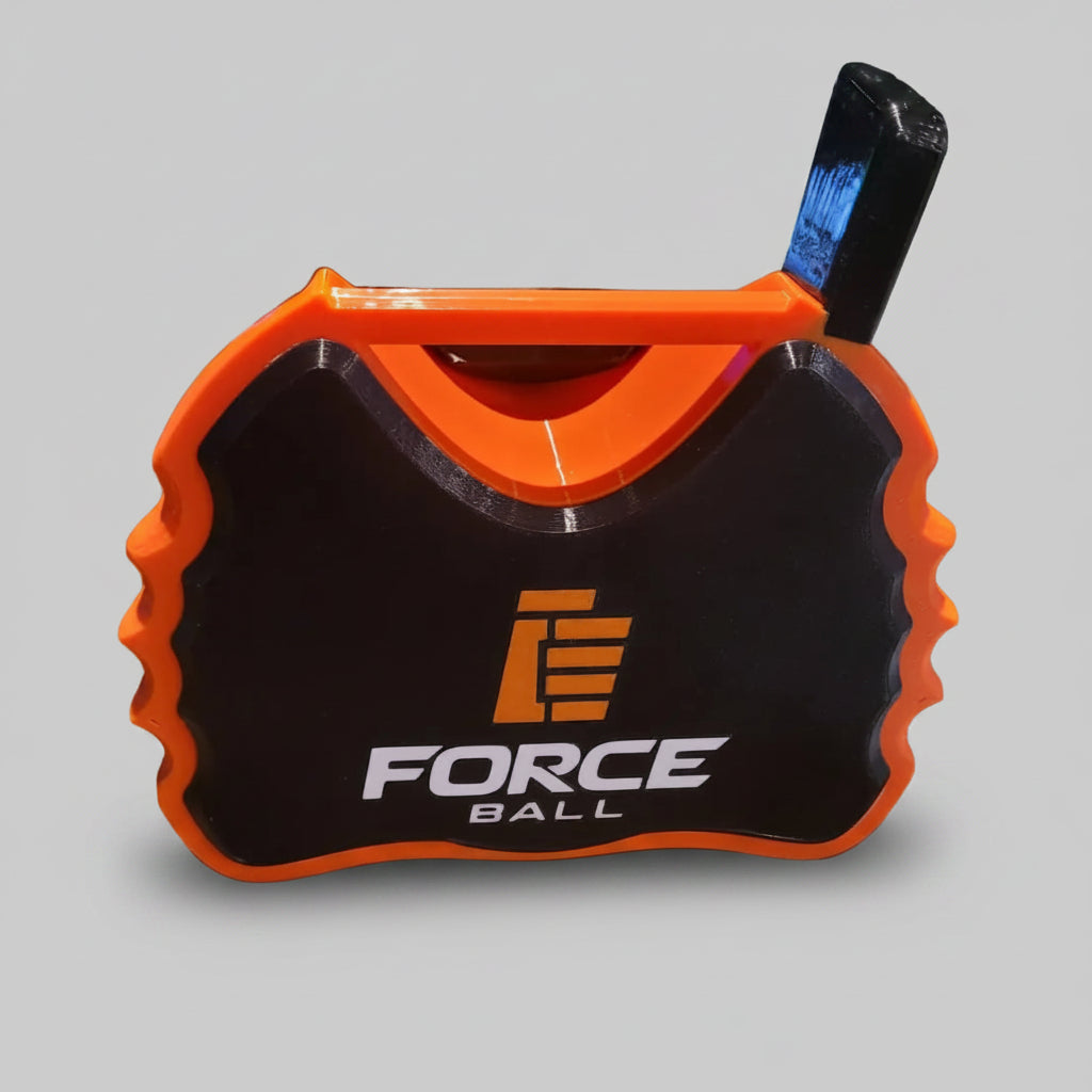 Force Ball device on a wooden surface with a blurred background